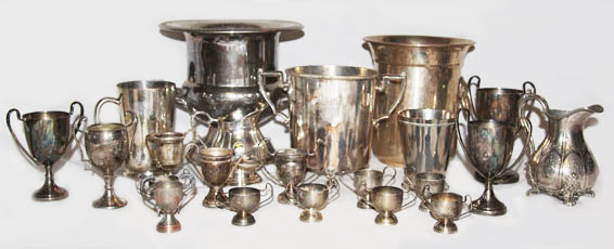 metal odds and sods vintage baby trophies to rent